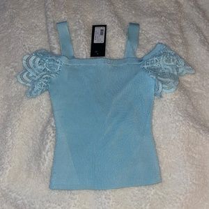Baby blue off shoulder top tags on